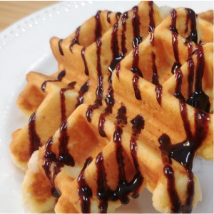 Coconut Waffle With Chocolate Syrup